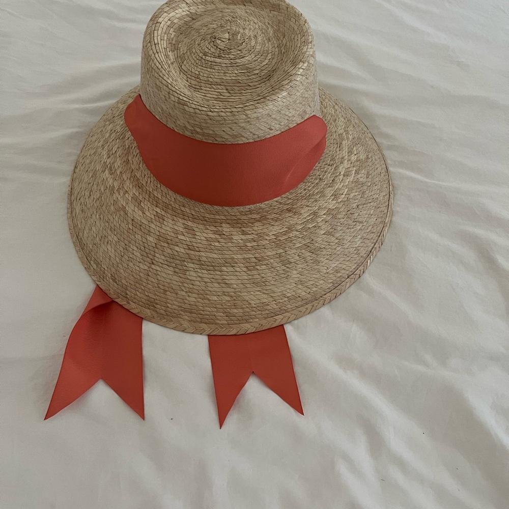 Chic Straw Hat with Red Ribbon Accent
